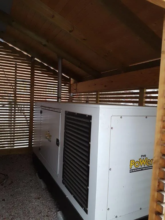 Enclosed standby generator installed for critical backup power